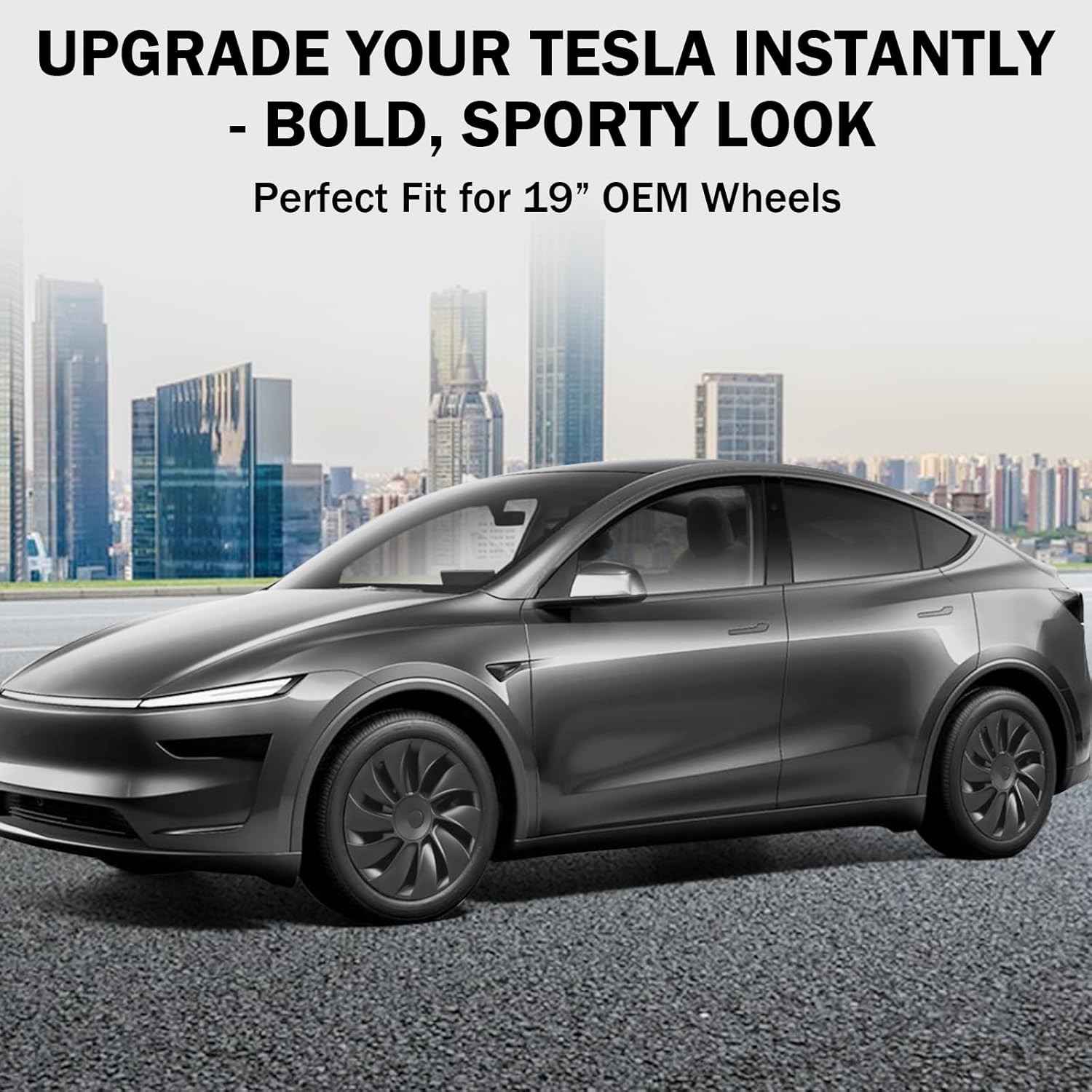 Matte black Tesla Model Y with bold 19-inch OEM wheels, cityscape background